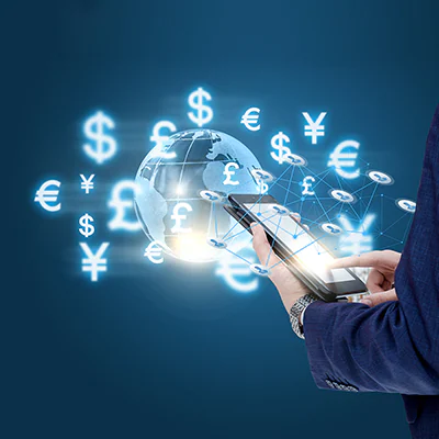 A gentleman is using his phone to conduct foreign exchange transcaction