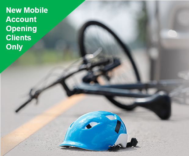 A broken bicycle and a helmet