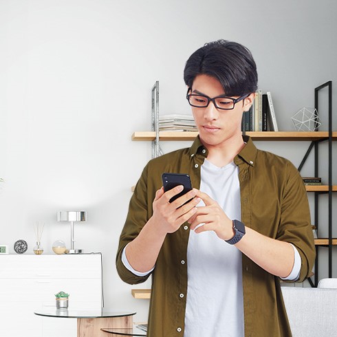 A young man using mobile phone